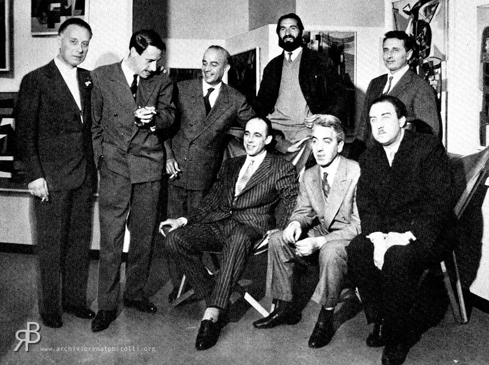 Foto di gruppo all'inaugurazione della collezione Cavellini, Brescia, 10 maggio 1953. Da sinistra Birolli, Moreni, Corpora, Vedova, Morlotti, Cavellini, Afro, Santomaso